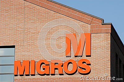 Logo sign of Migros food store Editorial Stock Photo