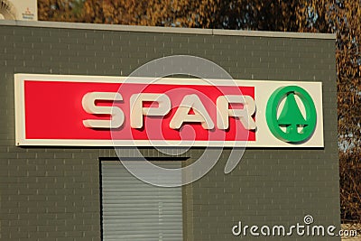 Logo of SPAR supermarktet at a Esso petrol station in NIeuwerkerk aan den ijssel in the Netherlands. Editorial Stock Photo