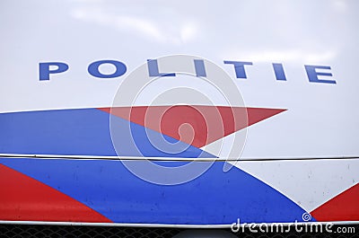 Logo and striping of the Dutch police (politie) on patrol car Stock Photo