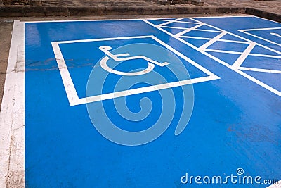 Logos for disabled on parking. handicap parking place sign in Thailand Stock Photo