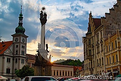 Loket, Czech Republic; 5/19/2019: Sunset in the cloudy skyline of the Loket Market or main square of Loket, with the Holy Editorial Stock Photo