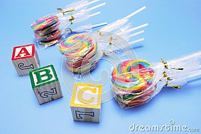 Lollipops with Alphabet Blocks Stock Photo