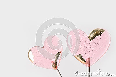 Lollipops pink candy on stick. Valentine's day romantic greeting card. Stock Photo