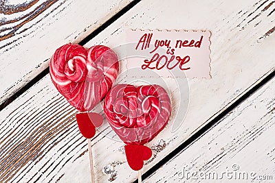 Lollipops and red hearts. Stock Photo