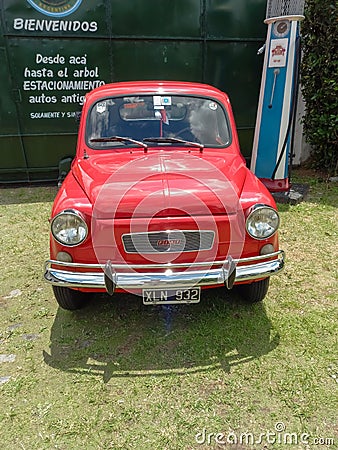 red Fiat 600 sedan two door rear engined unibody built in Argentina 1970s. CADEAA 2021 classic cars Editorial Stock Photo