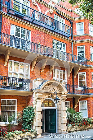 London. Beautiful house entrance of periodic building in Chelsea, one of the richest areas to live with fancy lifestyle Editorial Stock Photo