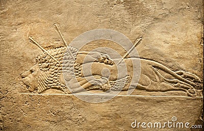 London. British museum. Hunting relief from Palace of Assurbanipal in Nineveh, Assyria Editorial Stock Photo