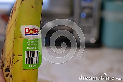 London Canada, April 20 2019: Editorial illustrative photo of a banana peel that has a Dole sticker that says Costa Rica Editorial Stock Photo