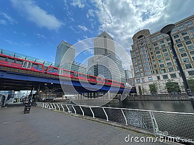 London Canary Wharf DLR train and port Editorial Stock Photo