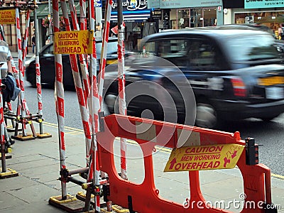 Construction Scaffolding and Warning Signs, London, UK Editorial Stock Photo