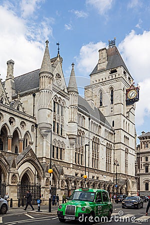 The Victorian Gothic style main entrance to the The Royal Courts of Justice public building in London Editorial Stock Photo