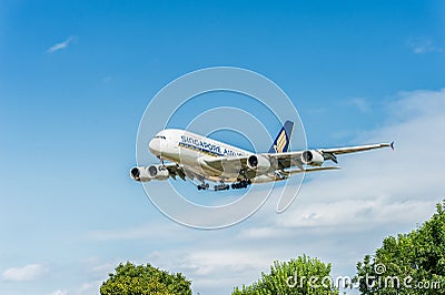 LONDON, ENGLAND - AUGUST 22, 2016: 9V-SKB Singapore Airlines Airbus A380 Landing in Heathrow Airport, London. Editorial Stock Photo