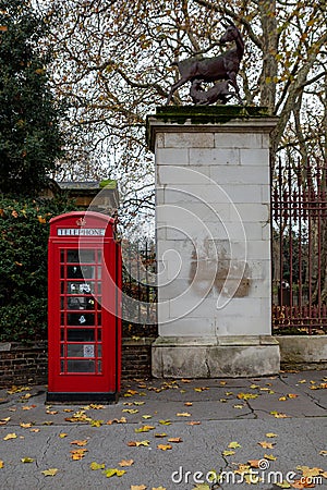 London, England December 2022. Classic, retro red phone booth. London's vintage red phone boxes Editorial Stock Photo