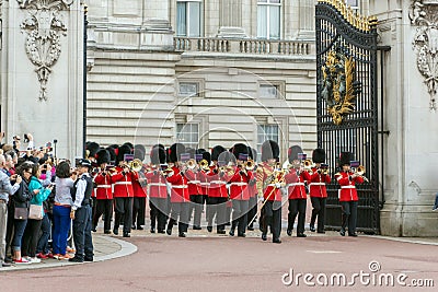 LONDON, ENGLAND - JUNE 17 2016: British Royal guards perform the Changing of the Guard in Buckingham Palace, London, Grea Editorial Stock Photo