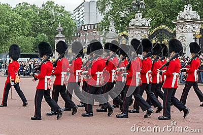 LONDON, ENGLAND - JUNE 17 2016: British Royal guards perform the Changing of the Guard in Buckingham Palace, London, Grea Editorial Stock Photo