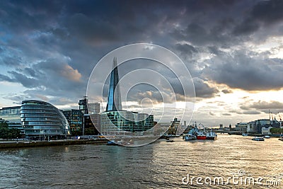 LONDON, ENGLAND - JUNE 15 2016: Sunset photo of The Shard skyscraper and City Hall from Thames river, Great Britain Editorial Stock Photo