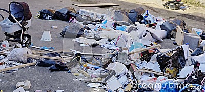 Fly tipping of waste and rubbish black bin bags in residential area Editorial Stock Photo