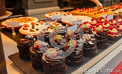 London: Upscale cafe with beautiful desserts full of cakes and colorful pastries Editorial Stock Photo
