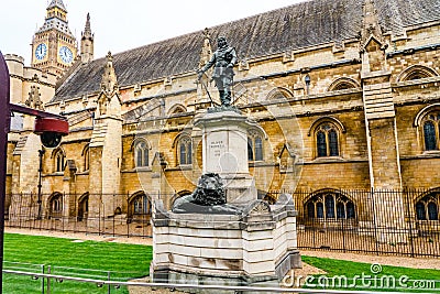 London, England - 23.04.2022: Oliver Cromwell monument outside Houses of Parliament, Westminster, London. Editorial Stock Photo