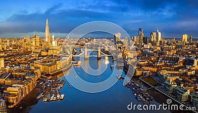 London, England - Panoramic aerial skyline view of London including iconic Tower Bridge with red double-decker bus Stock Photo
