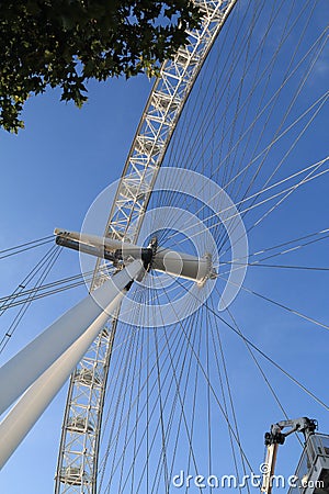 The London Eye in a Blue Sky Editorial Stock Photo