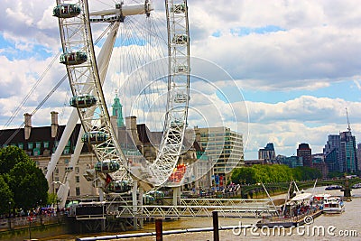 The london eye on the river under a gray and cloudy spring sky Editorial Stock Photo