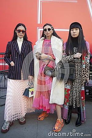 Stylish attendees gathering outside 180 The Strand for London Fashion Week Editorial Stock Photo