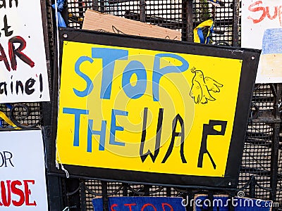 `Stop the War` in Ukraine sign and dove of peace motif. London UK. Editorial Stock Photo
