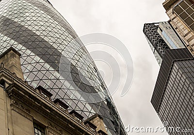 London Gherkin Building and Surrounding Offices Editorial Stock Photo