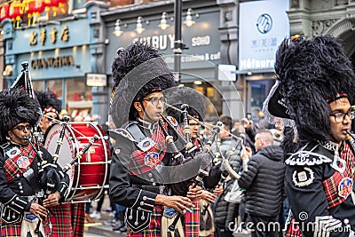 London, January 26, 2020. Shree Muktajeevan Swamibapa Pipe Band. Members of parade in London Chinatown. Chinese New Year Editorial Stock Photo