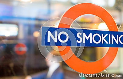 LONDON - JULY 2, 2015: No Smoking sign in the city. It is illega Editorial Stock Photo