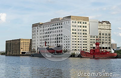 LONDON - JUNE 25 : SS Robin and Trinity lightship next to the Mi Editorial Stock Photo