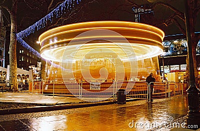 London, Merry go round or ferry-go-round at night Editorial Stock Photo