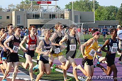 Editorial photo of a large group of competitive runners running on a track, London Ontario Editorial Stock Photo