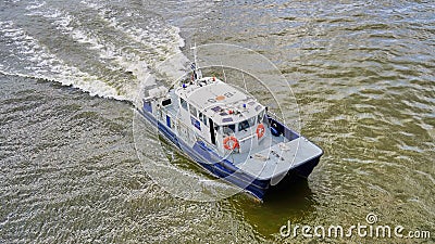 London Port Authority Habor Master Boat speeds down Thames River Editorial Stock Photo