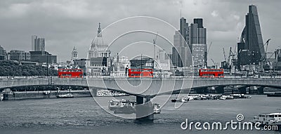 London skyline with red buses Stock Photo