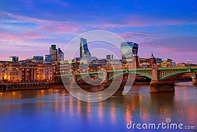 London skyline sunset Southwark bridge UK Stock Photo