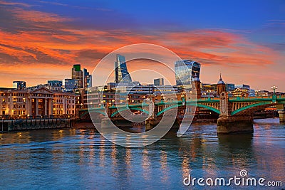 London skyline sunset Southwark bridge UK Stock Photo