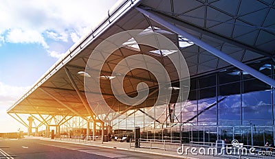 LONDON STANSTED AIRPORT, UK - MARCH 23, 2014: Airport building in sun rise Editorial Stock Photo