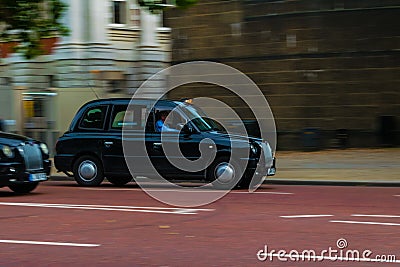 A London Taxi Driving up the Mall towards Buckingham Palace Editorial Stock Photo