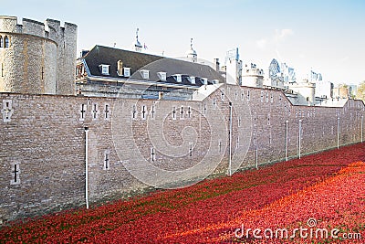 LONDON TOWER - OCTOBER 11 2014. Ceramic poppies installation by Editorial Stock Photo