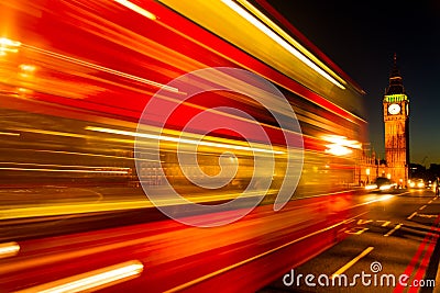 London traditional red bus in movement over the Westminster Bridge, London, UK Stock Photo