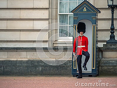 English soldier patrolling at Buckingham Palace Editorial Stock Photo