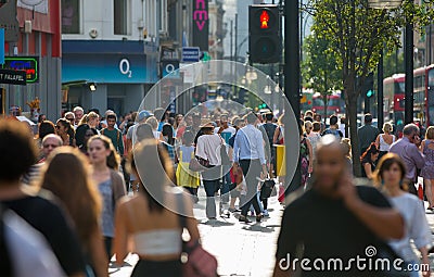 Lots of people walking in Oxford street, the main destination of Londoners for shopping. Modern life concept. London Editorial Stock Photo