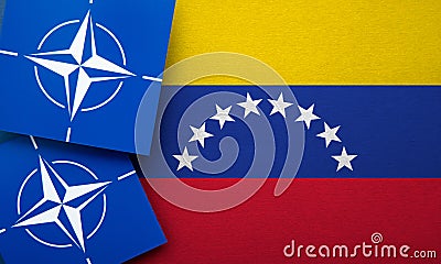 LONDON, UK - August 2022: NATO North Atlantic Treaty Organization military alliance logo on a Venezuela flag Stock Photo