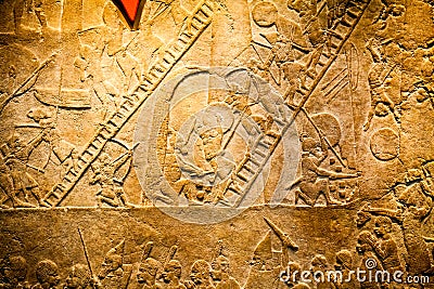 LONDON, UK, BRITISH MUSEUM - Details from the Assyrian wall Editorial Stock Photo