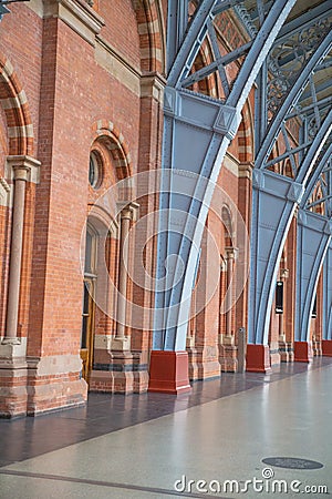 Portrait View of the Walls and Metal Arches of the St Pancras railway station Editorial Stock Photo