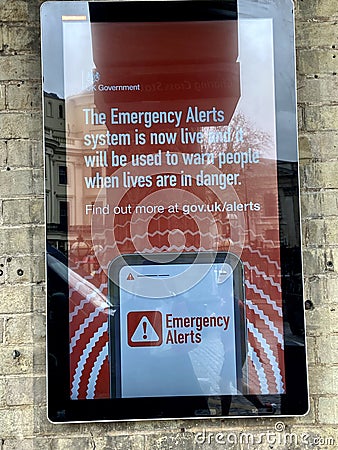 London, UK -14. 04.23: Emergency phone alert for smartphone after poster. Illustrative editorial taken - April 14, 2023. Editorial Stock Photo