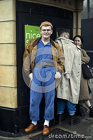 Fashionable people on the street . Street style Editorial Stock Photo