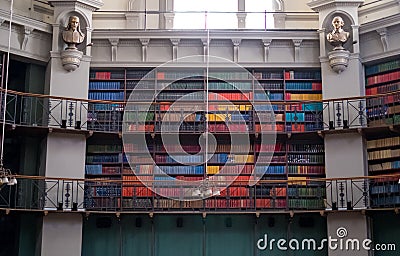 Interior of the Octagon Library at Queen Mary, University of London in Mile End, East London, with colourful leather bound books Editorial Stock Photo